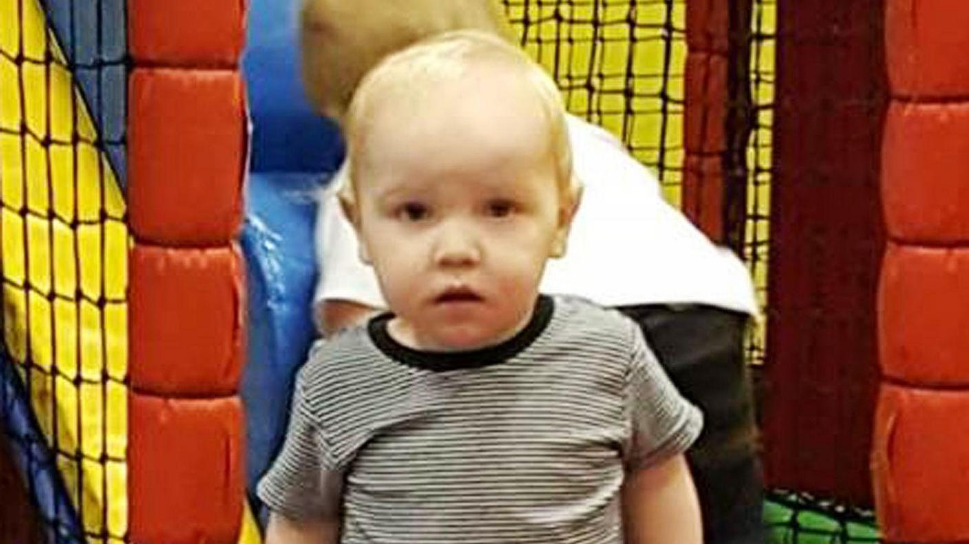 Harry Studley, a blond toddler, at a soft play centre