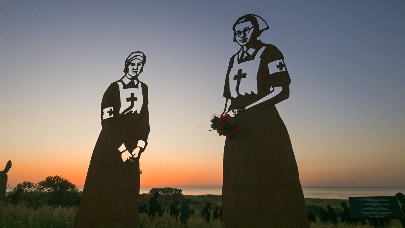 The two nurse silhouettes in the Standing with Giants installation