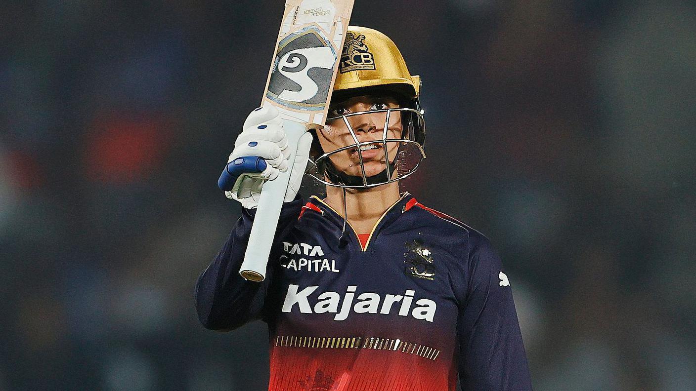 Royal Challengers Bengaluru's Smriti Mandhana celebrates her half-century against Delhi Capitals