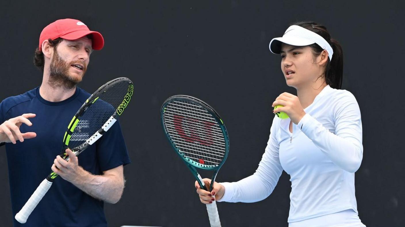 Nick Cavaday talks to Emma Raducanu during practice at the Australian Open