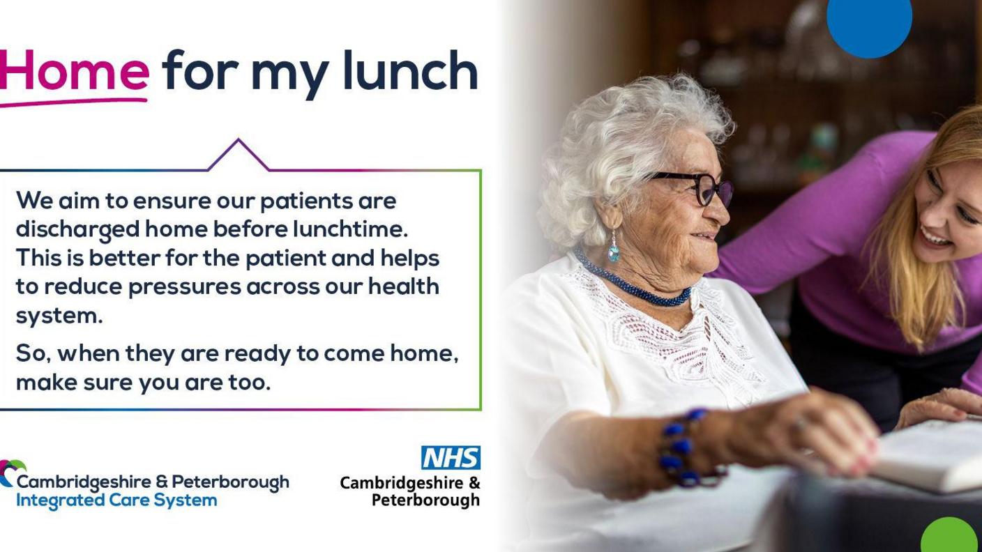 A poster with the message "home for my lunch". It includes an elderly woman in a white T-shirt and black framed glasses being comforted by a woman in a purple long-sleeve top. They are both smiling.