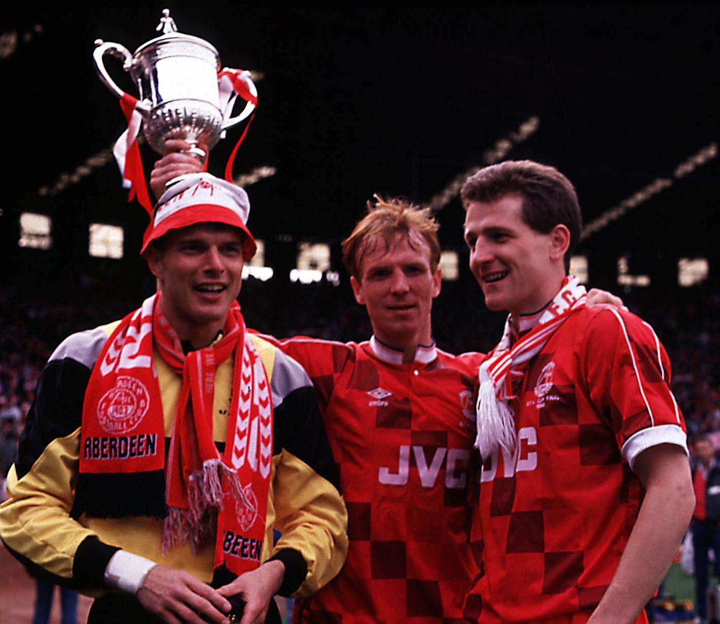 Theo Snelders, Alex McLeish and Brian Irvine celebrate Aberdeen winning the Scottish Cup final in 1990