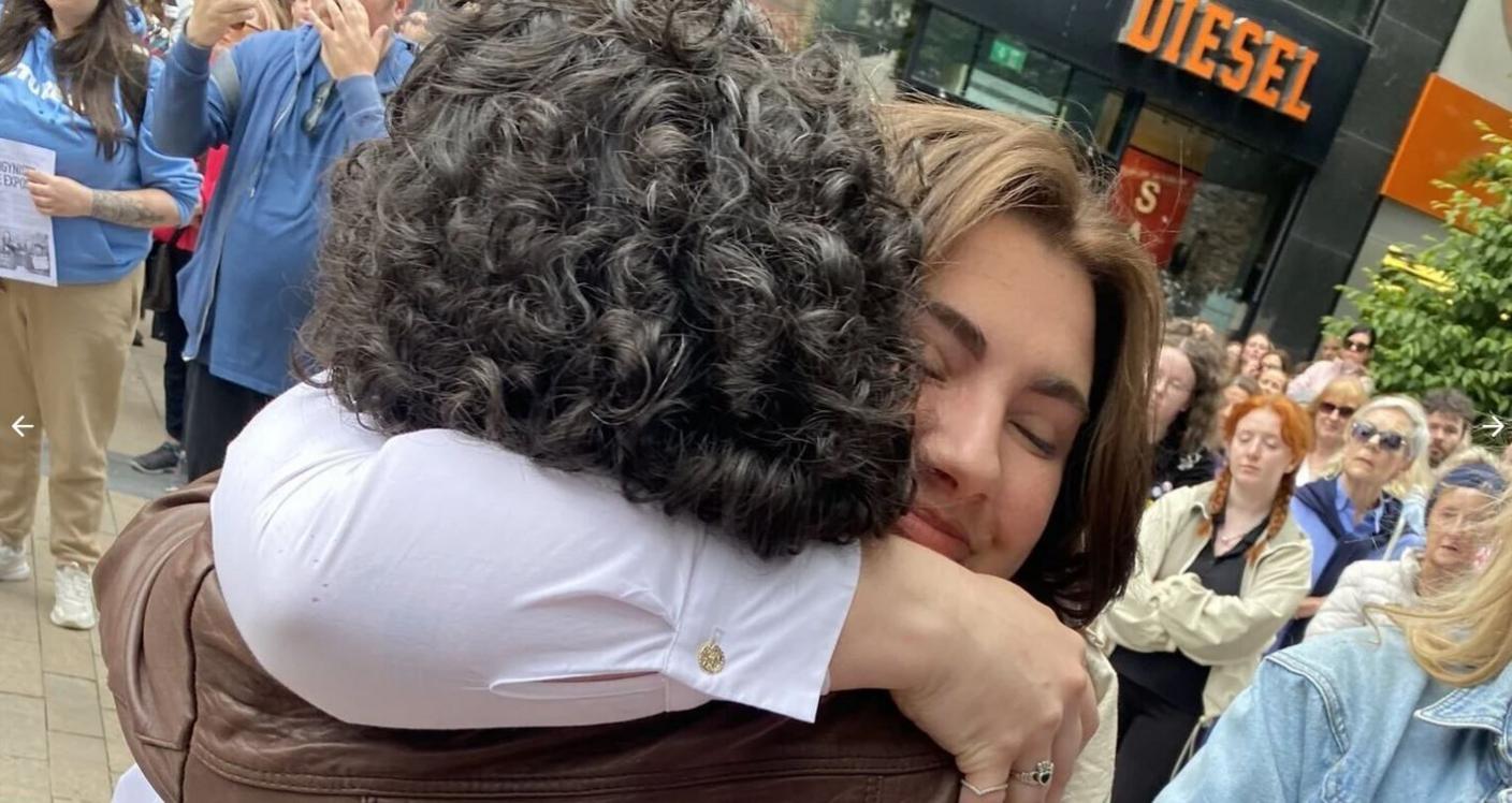 Natasha O'Brien hugs a supporter at a rally in Limerick on Saturday