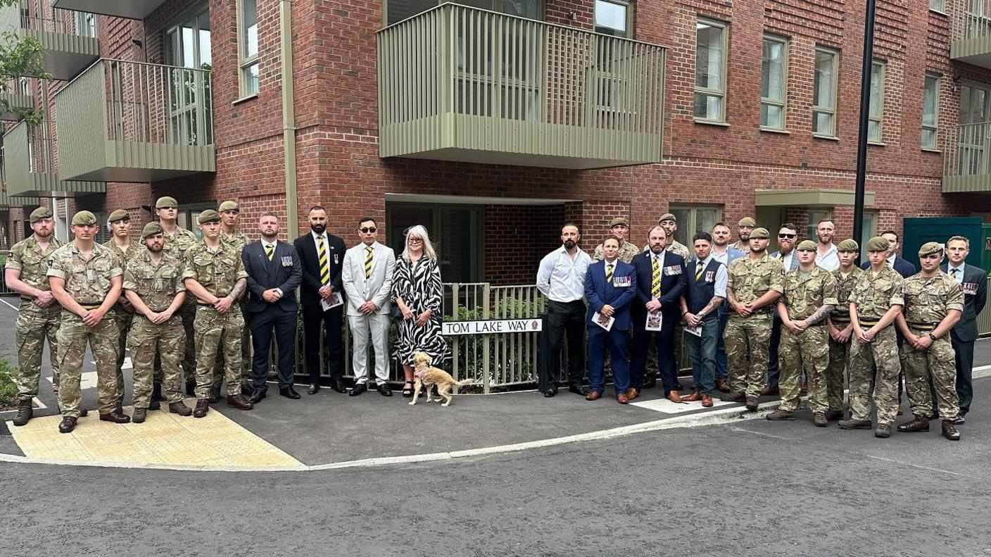 The ceremony to unveil Tom Lake Way