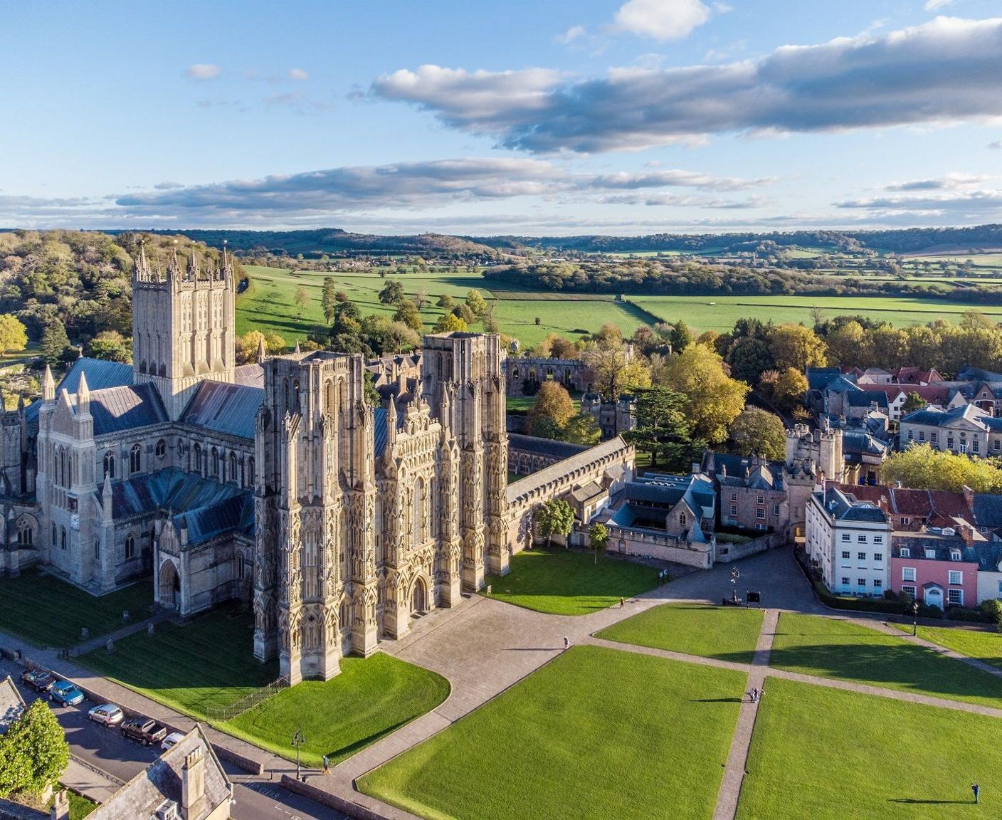 Wells Cathedral and city centre seen from the air on a sunny day