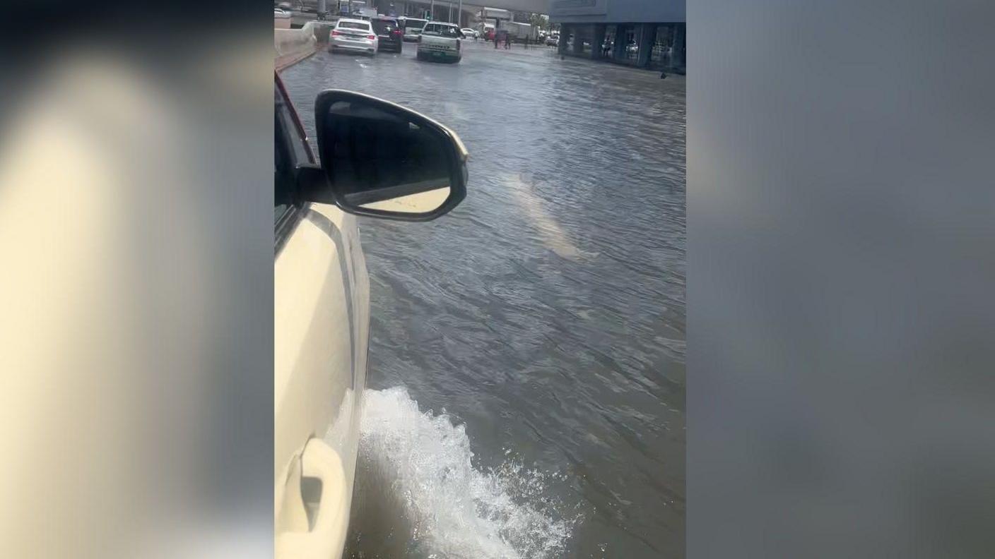 A car driving through flood water