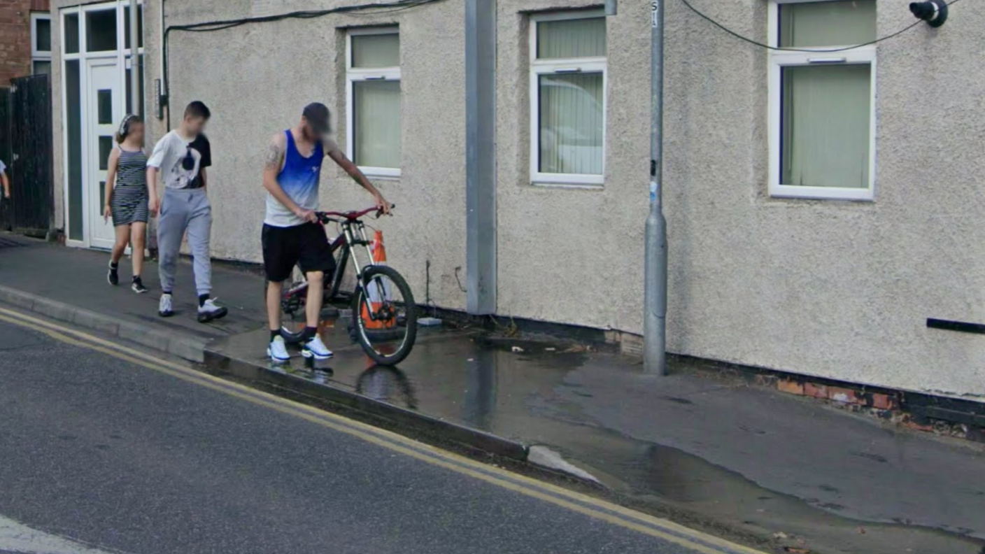 A Google Maps screenshot of Station Road, dated to July 2024, showing a leak from the stretch of pavement which has now been commemorated.