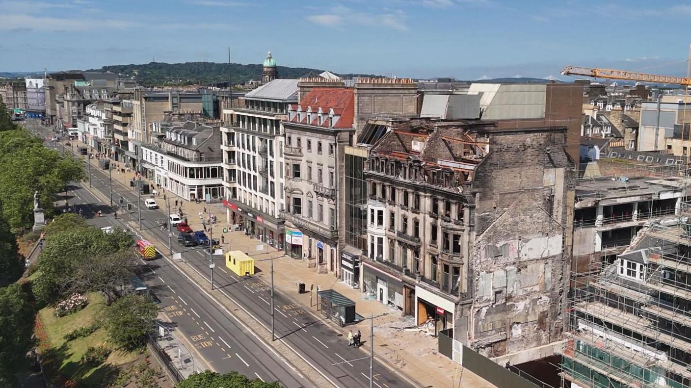 A drone shot of the former Debenhams building on Princes Street.