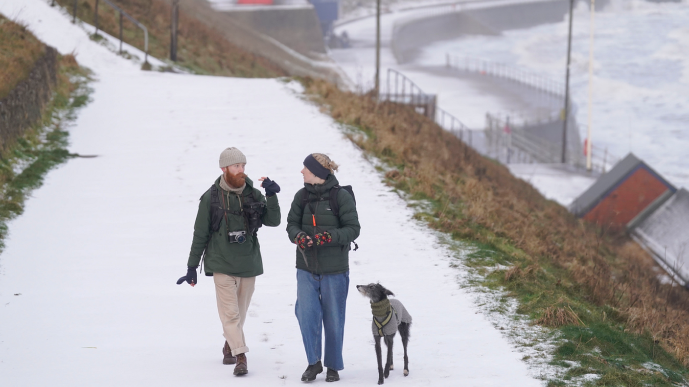 Snowy conditions on Whitby seafront in Yorkshire.