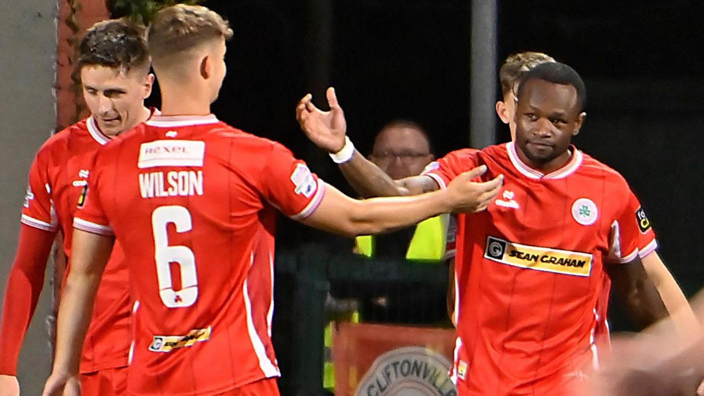 Eric McWoods celebrates scoring