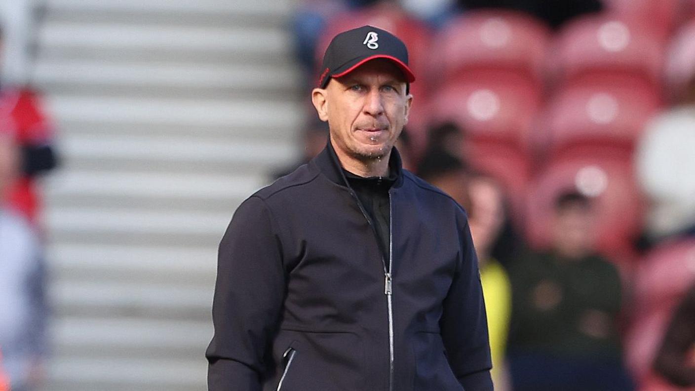 Gerhard Struber standing on the pitch during pre-game warm-up