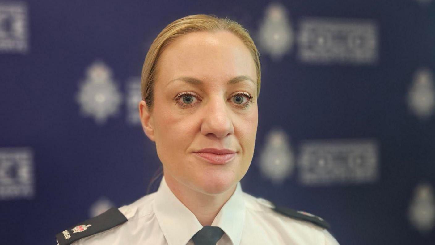 Supt Heather Maelor, looking at the camera, at the presentation