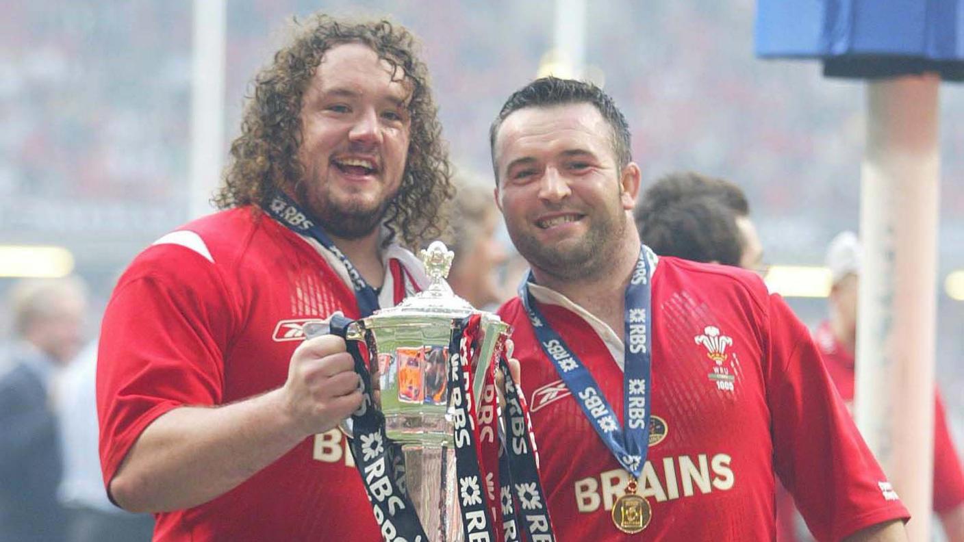 Adam Jones and Mefin Davies with trophy