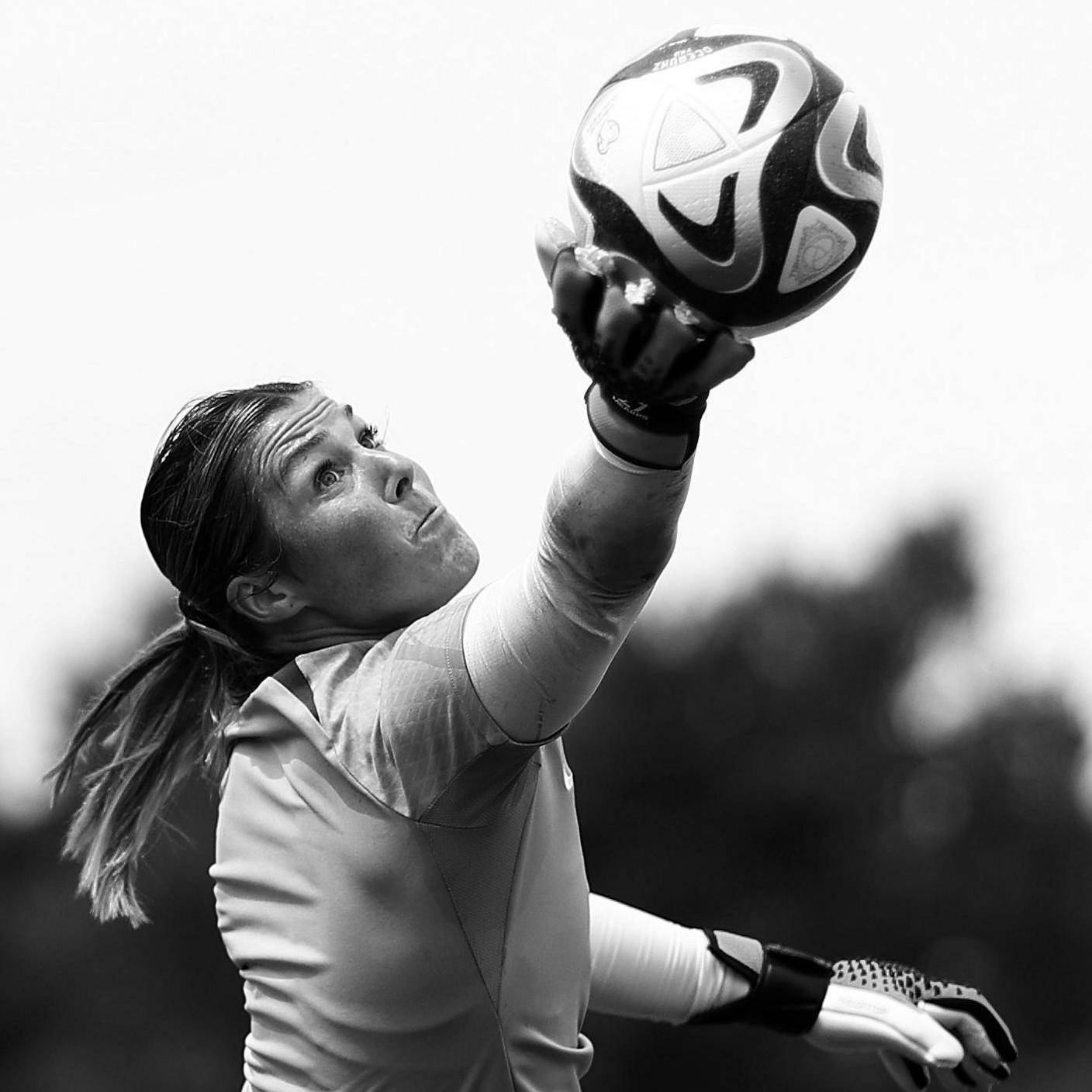Mary Earps palms the ball away in training