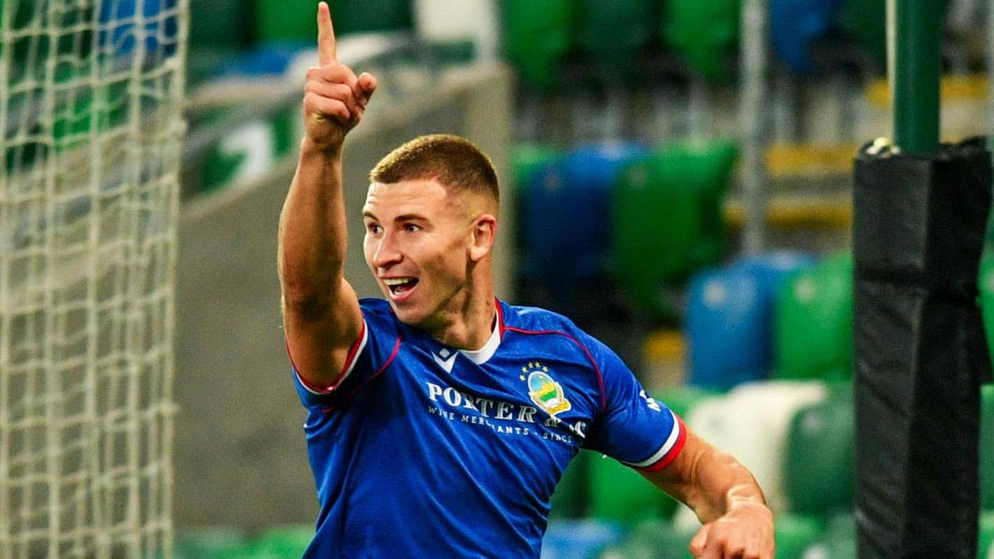 Ethan McGee celebrates scoring a goal