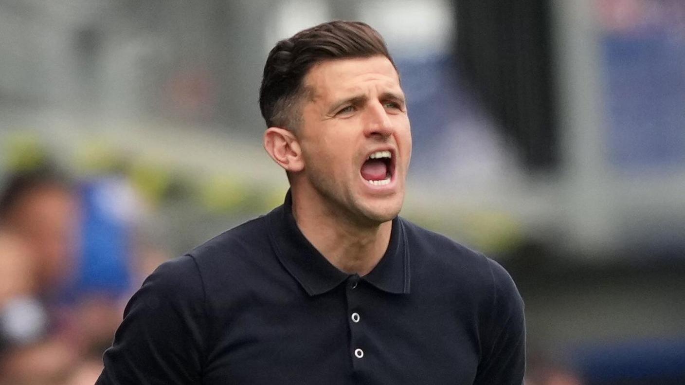 John Mousinho shouting