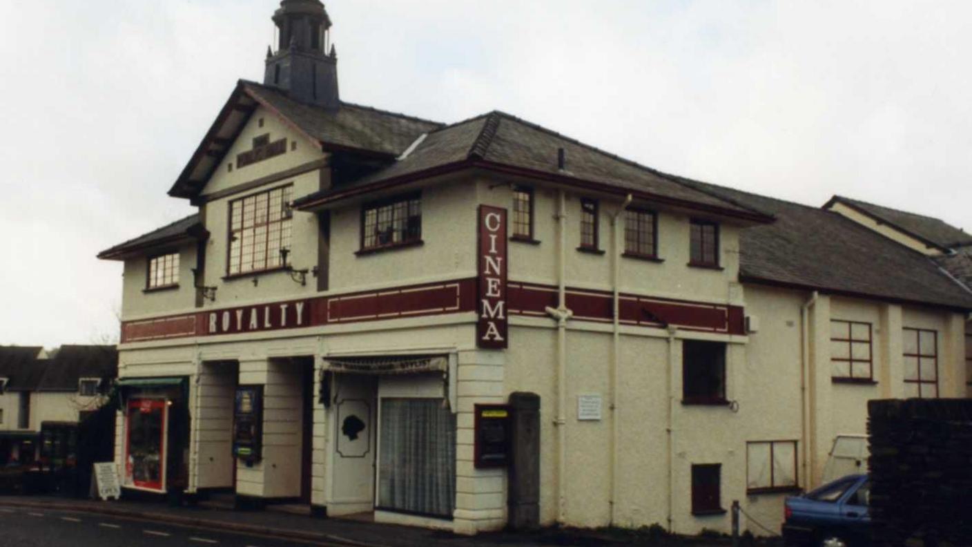 An aged, yellowing picture of the cinema.