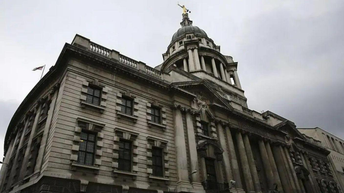 A general view of the outside of the Old Bailey, against a grey sky