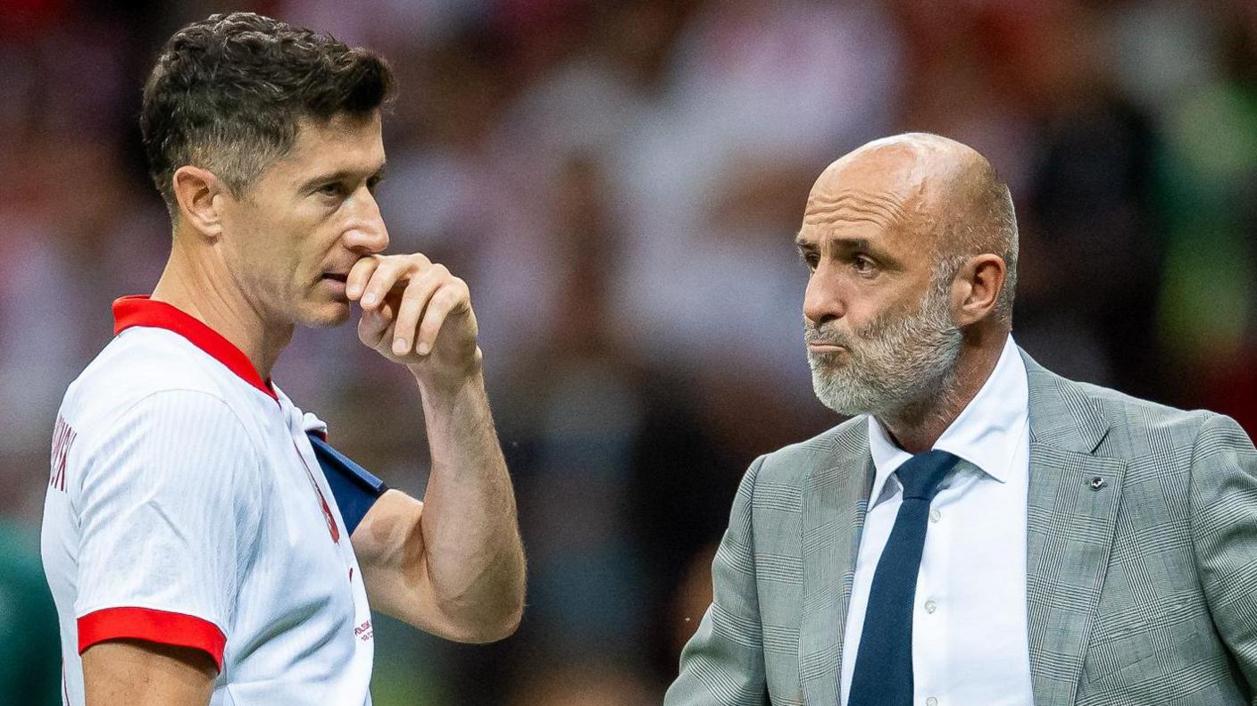 Poland striker Robert Lewandowski and Michal Probierz