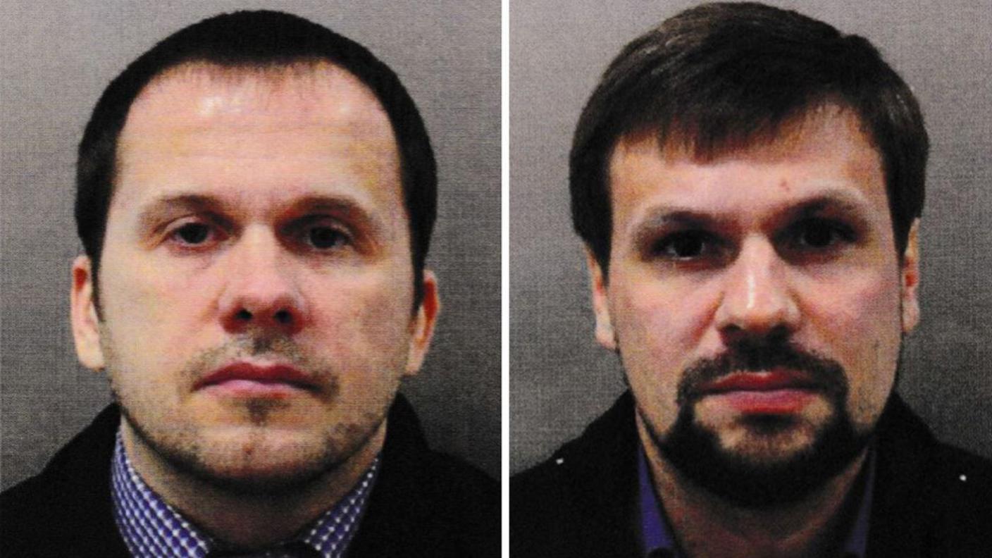 Composite of Alexander Petrov  and Ruslan Boshirov, two suspects in the Salisbury attack, images taken from the travel documents they used to enter the UK. Petrov has dark hair with a high hair line and stubble. Boshirov has thick brown hair, with a fuller beard and deep set eyes. 