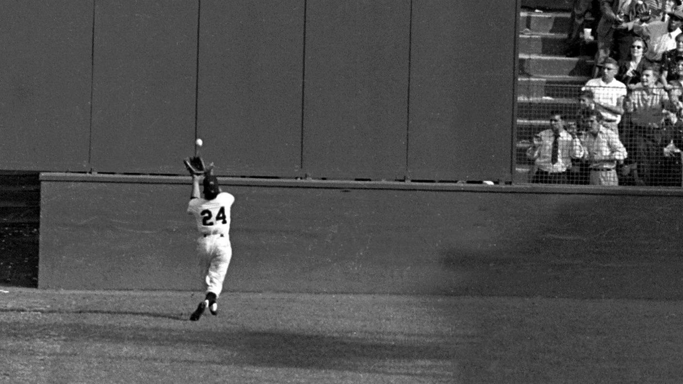 Willie Mays catches a baseball