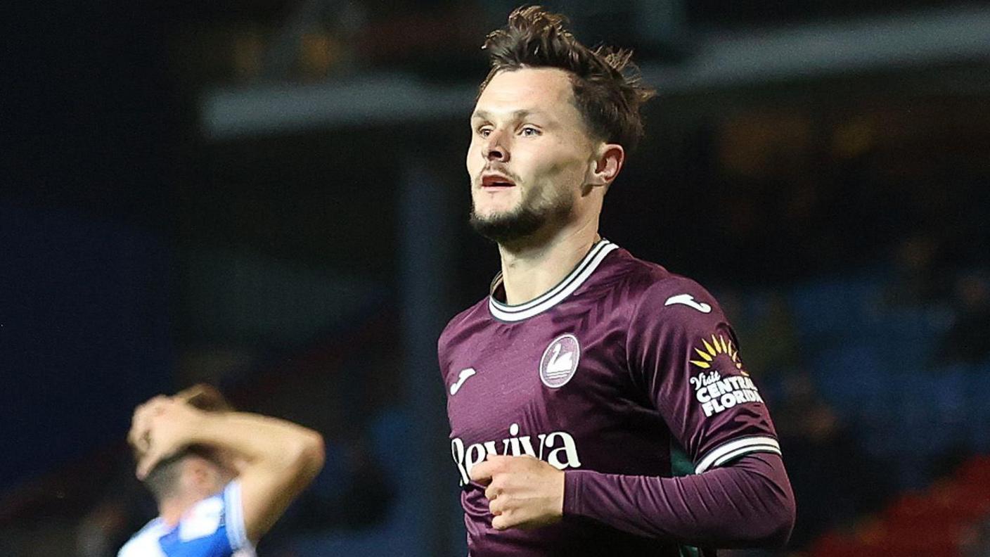 Liam Cullen celebrates his goal at Blackburn 