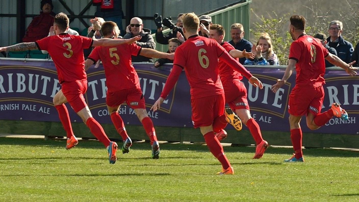 Truro City celebrate Shane White's goal