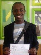 Dylan Kawende holding his results