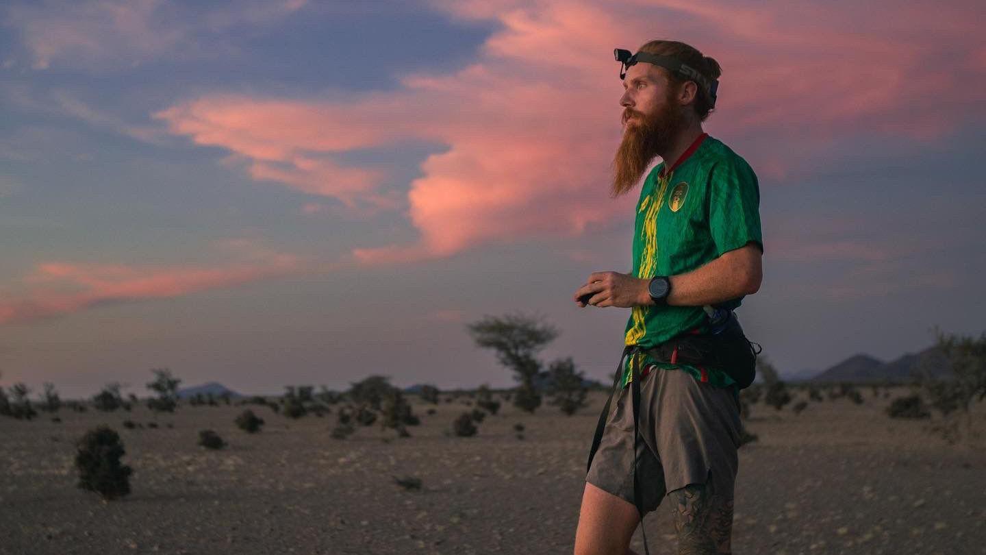 Russell Cook running in Africa