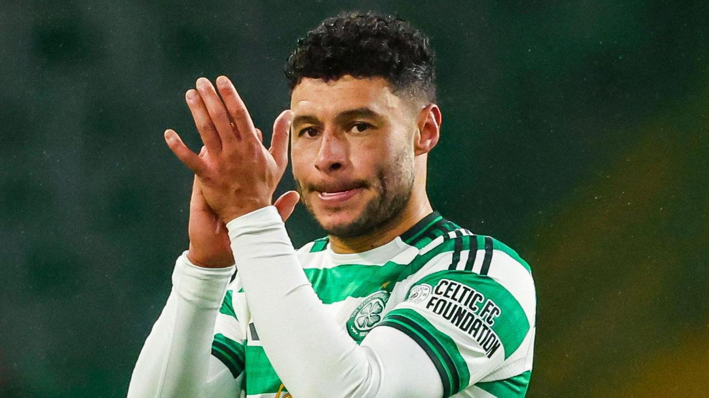 Alex Oxlade-Chamberlain claps Celtic supporters after scoring the winner against Livingston