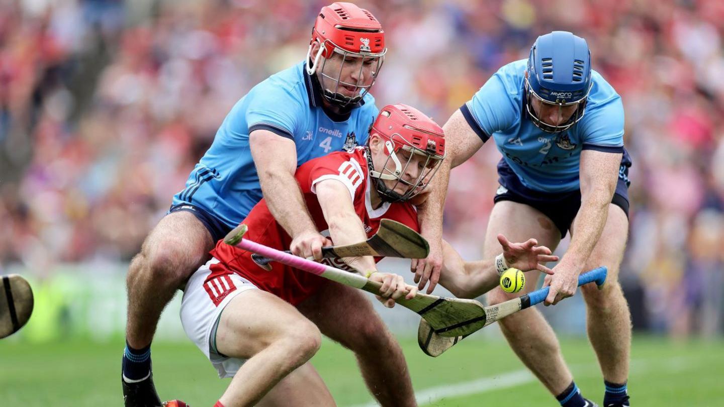 Dublin's Paddy Smyth and John Bellew with Cork's Alan Connolly