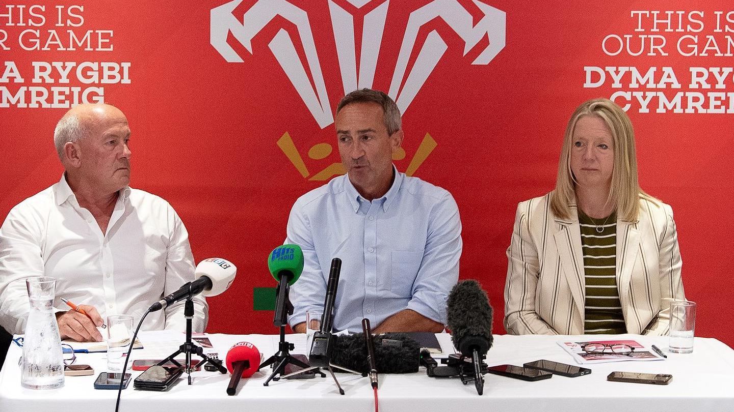 Richard Collier-Keywood, WRU chairman, Dave Reddin, WRU director of rugby and elite performance and Abi Tierney, WRU chief executive speaking at a press conference at the Principality Stadium in Cardiff