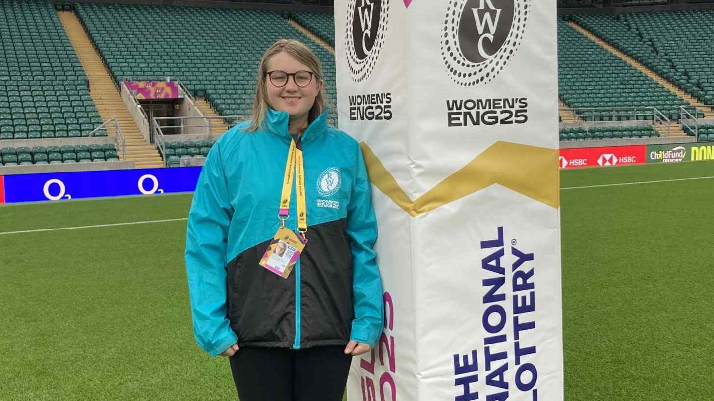 Beth Gibb standing next to the Women's Rugby Union World Cup goalpost at Twickenham at the final on Saturday. 