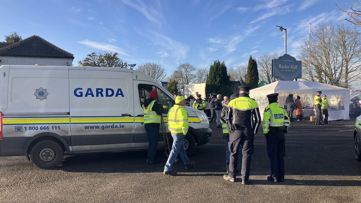 Gardai and protesters outside Roscrea hotel