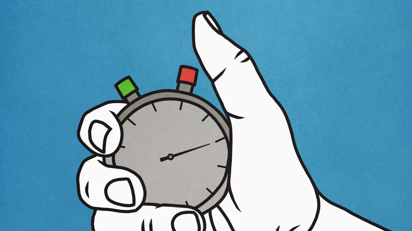 Man holding stopwatch