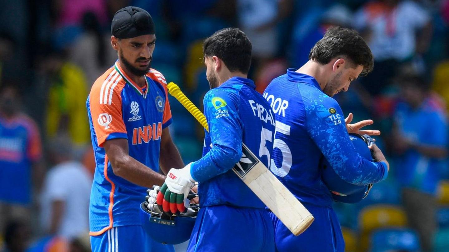 India bowler Arshdeep Singh is congratulated by Afghanistan's Fazalhaq Farooqi and Noor Ahmad after a T20 World Cup match in 2024