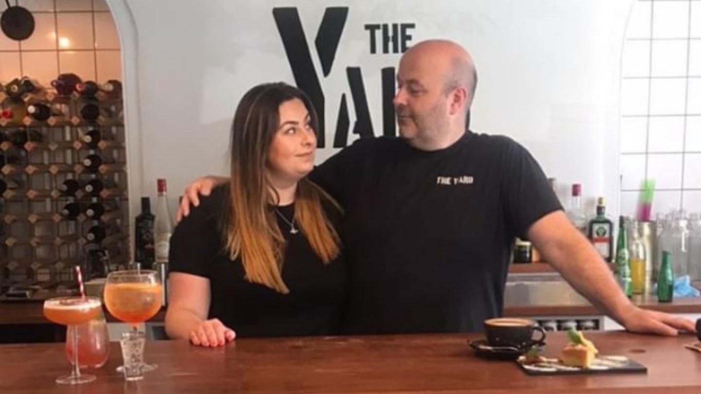 Emily at the restaurant's bar with her dad Paul