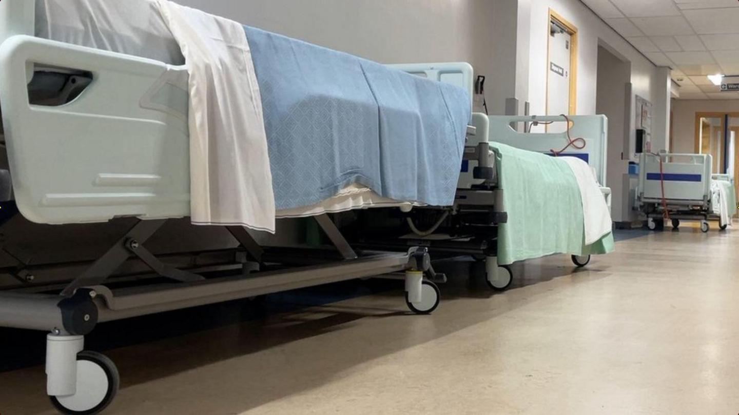 Hospital beds in a corridor at Noble's Hospital