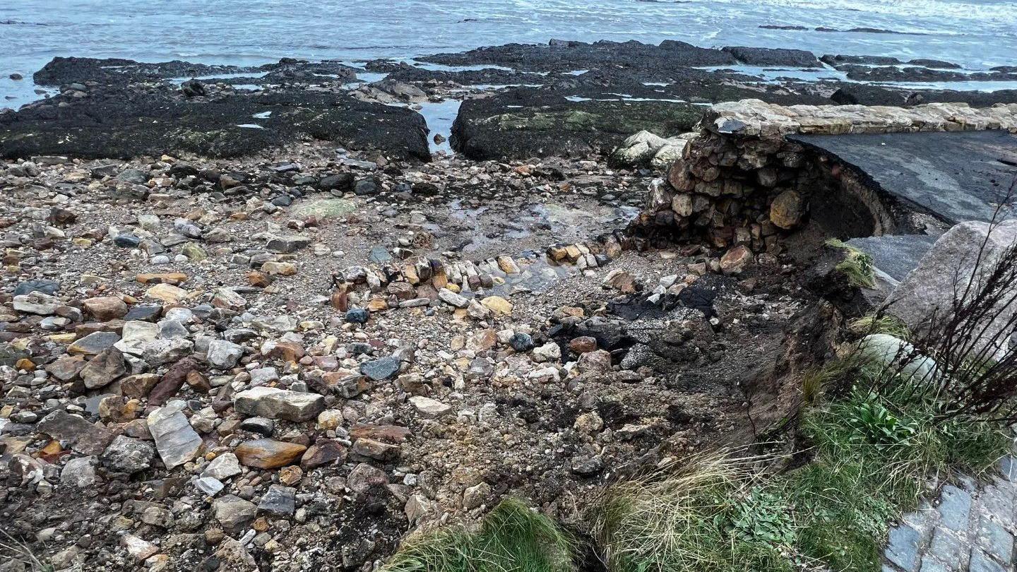 A section of the pier which was broken by storm damage