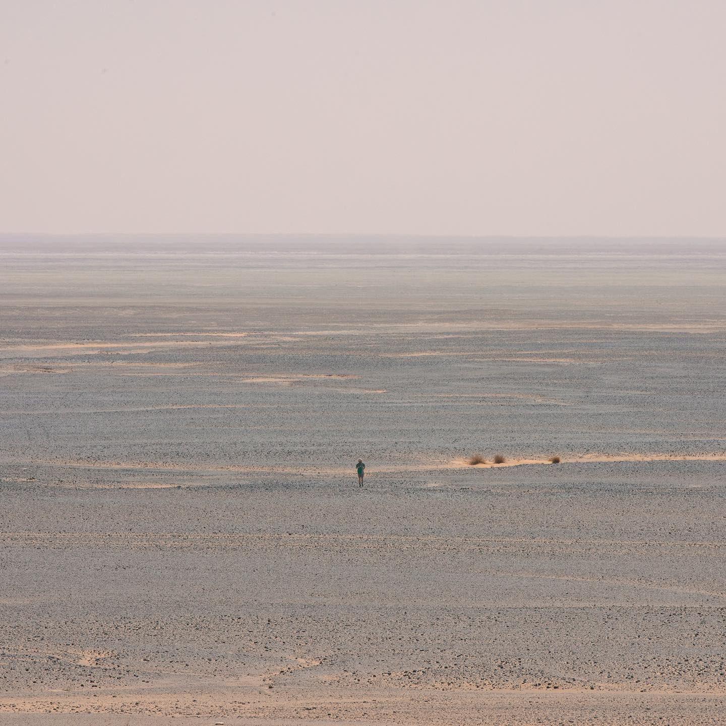 Russell Cook running in the Sahara Desert