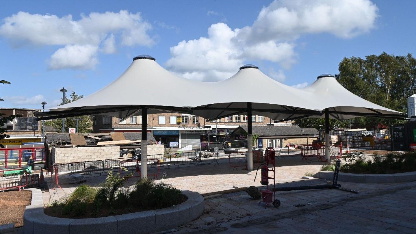 Shipley's market square with a new white canopy to protect traders on market days
