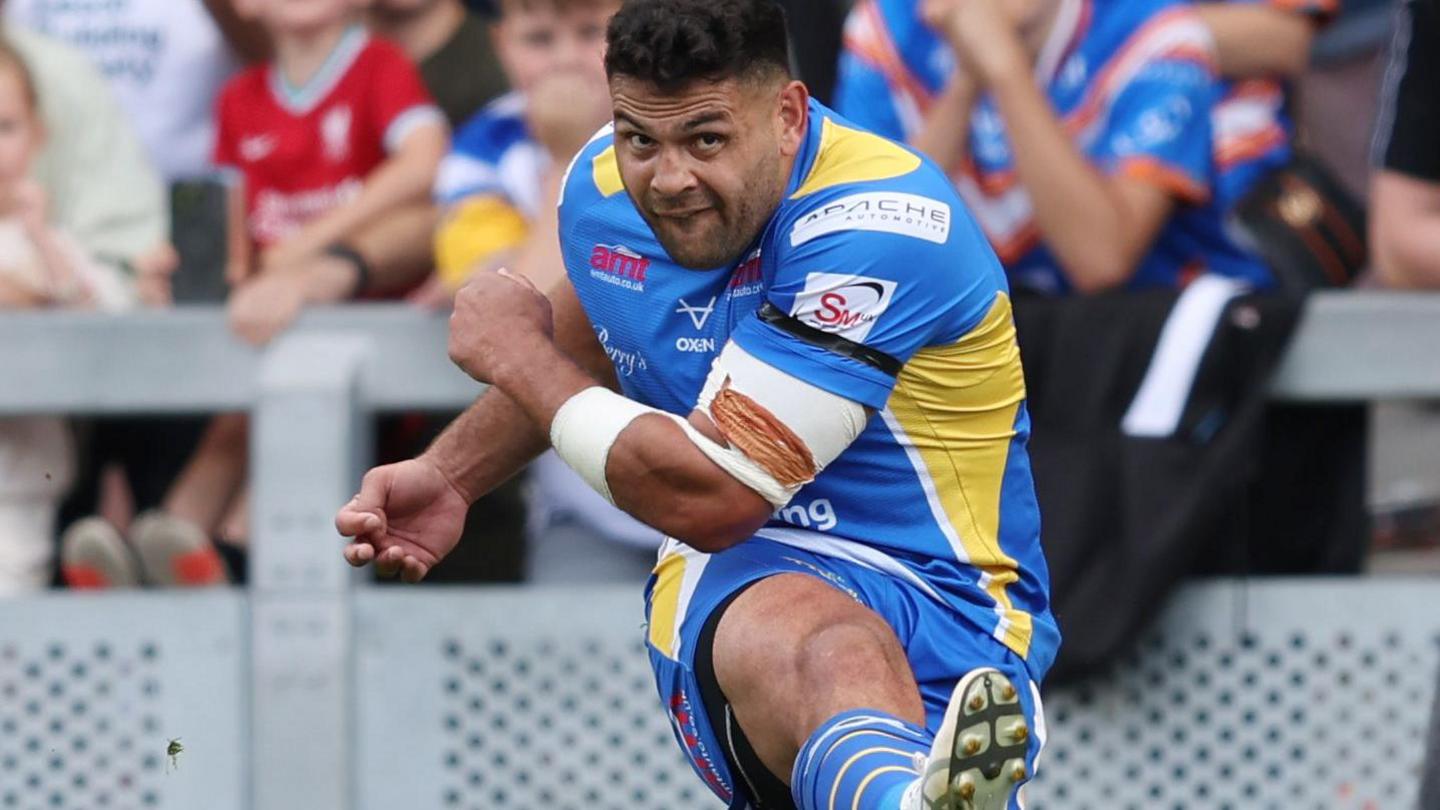 Rhyse Martin kicks a goal for Leeds Rhinos