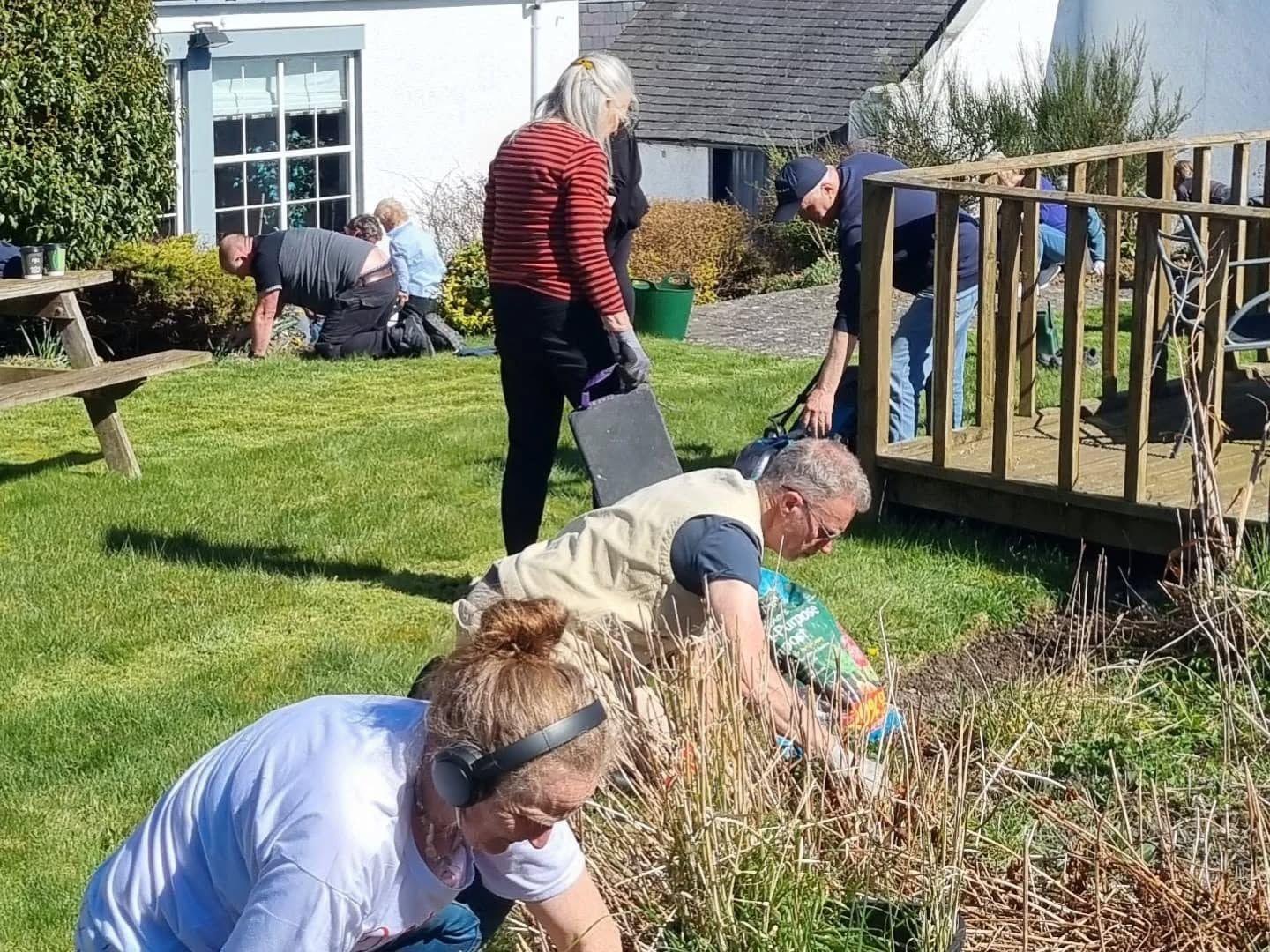 People at work gardening.
