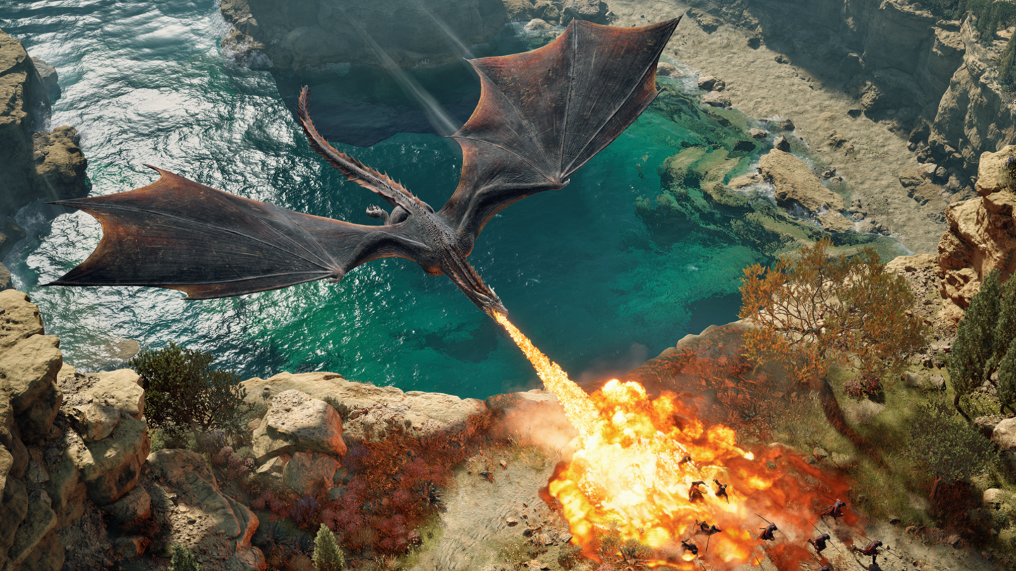 A computer gameplay image of a large black dragon breathing fire on soldiers, running away at the top of a cliff with lots of crystal clear blue water and rocks at the bottom of the cliff the dragon is flying over.