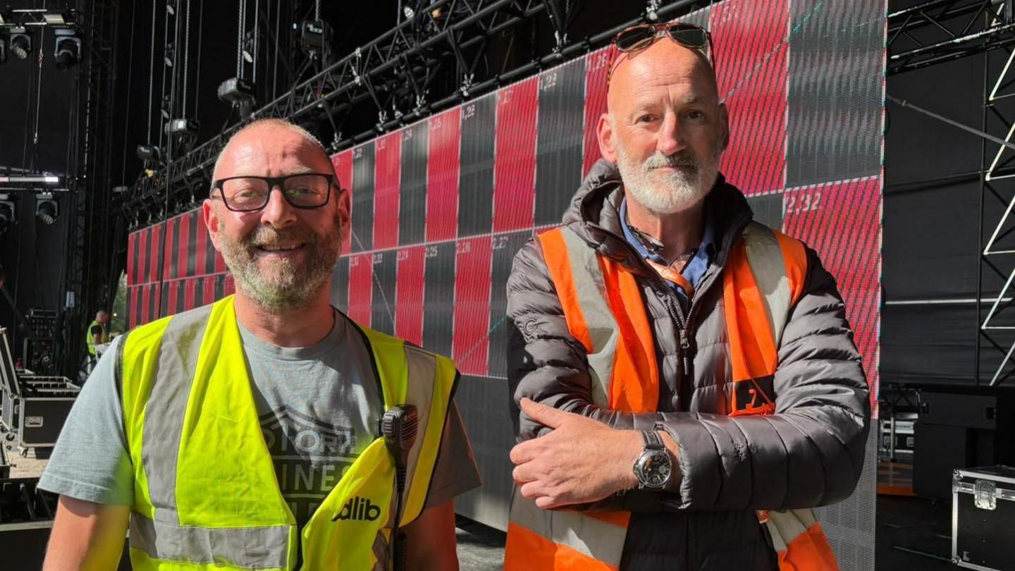 Two workers at Radio 2 in the Park