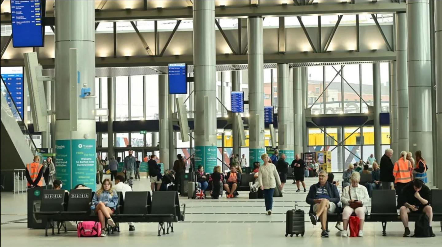 Interior of Grand Central Station with passengers sat in seats
