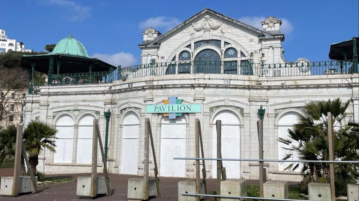 The Pavilion is painted white and boarded up to protect it from the elements. 