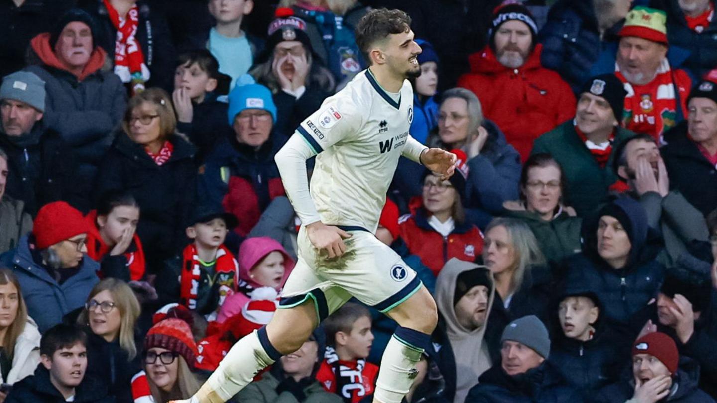 Millwall's Mihailo Ivanovic celebrates scoring at Wrexham