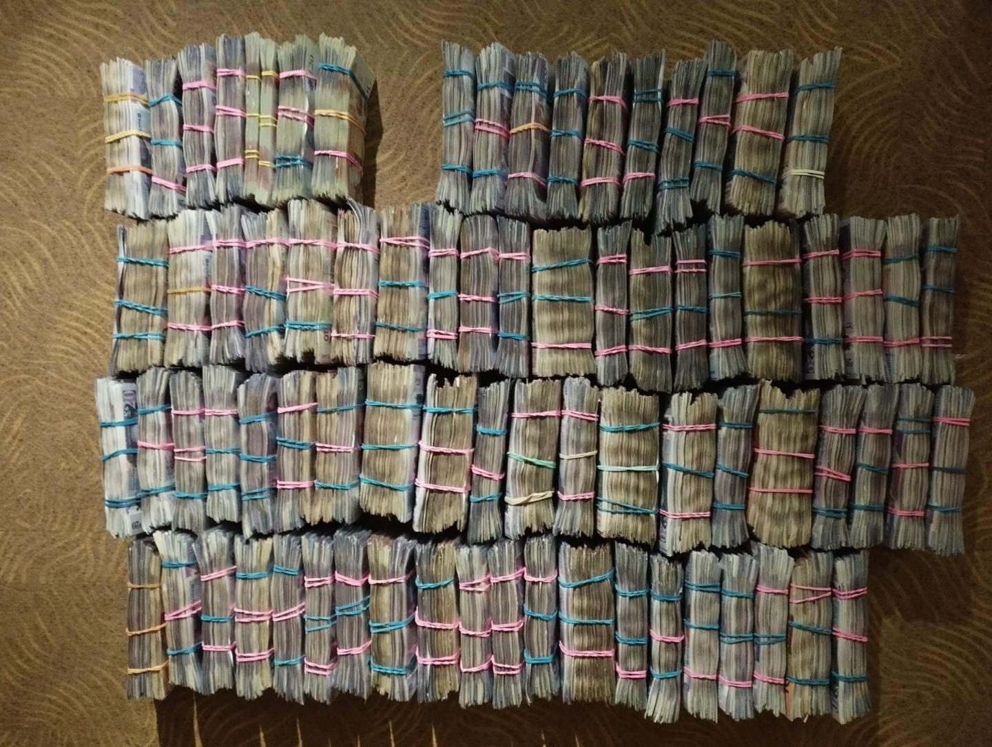 Bundles of cash recovered by the NCA