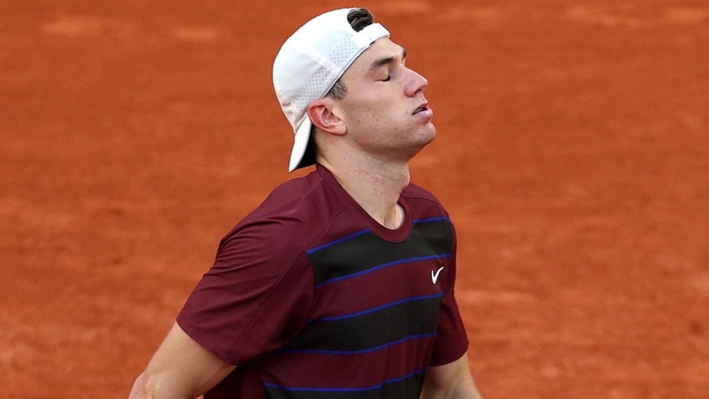 Jack Draper reacts to his loss to Alexander Bublik at the French Open